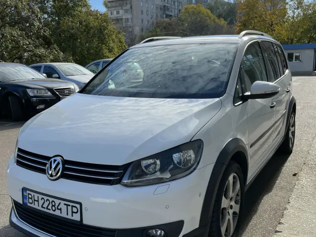 Volkswagen Touran - фото 1