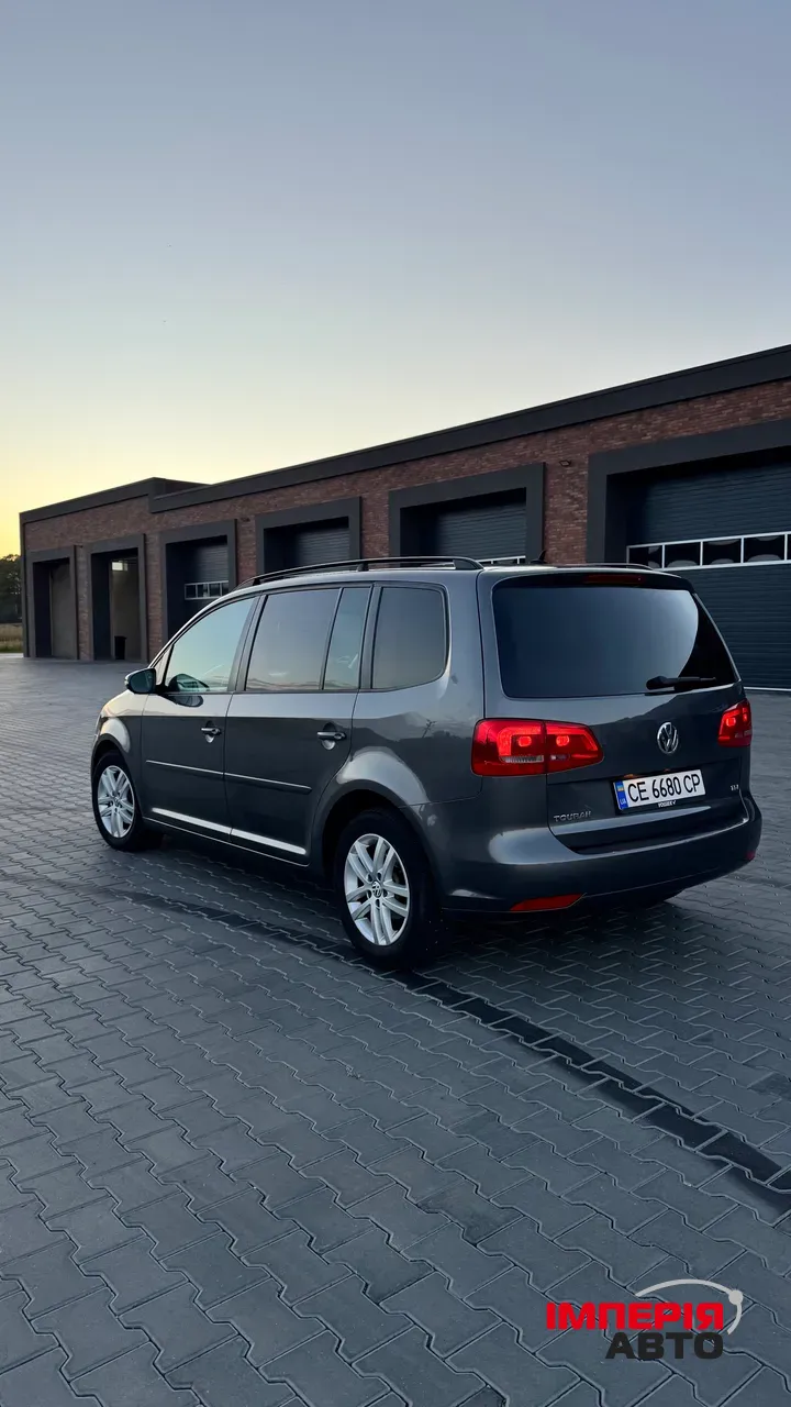 Volkswagen Touran - фото 10