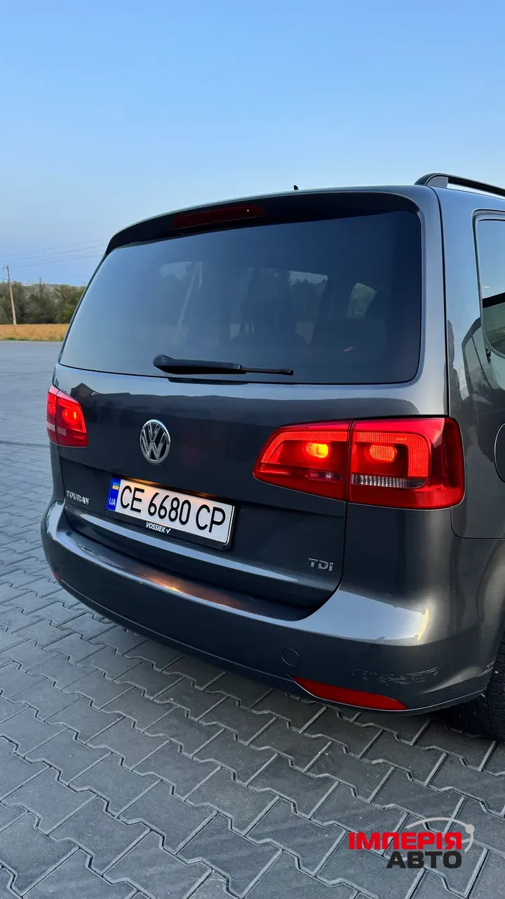 Volkswagen Touran - фото 24