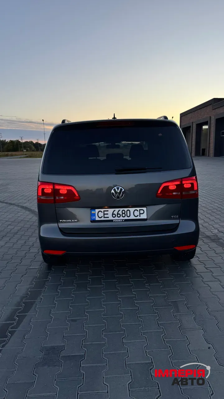 Volkswagen Touran - фото 8