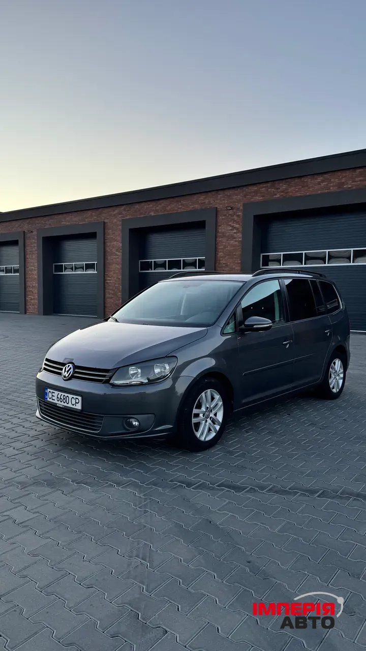 Volkswagen Touran - фото 1