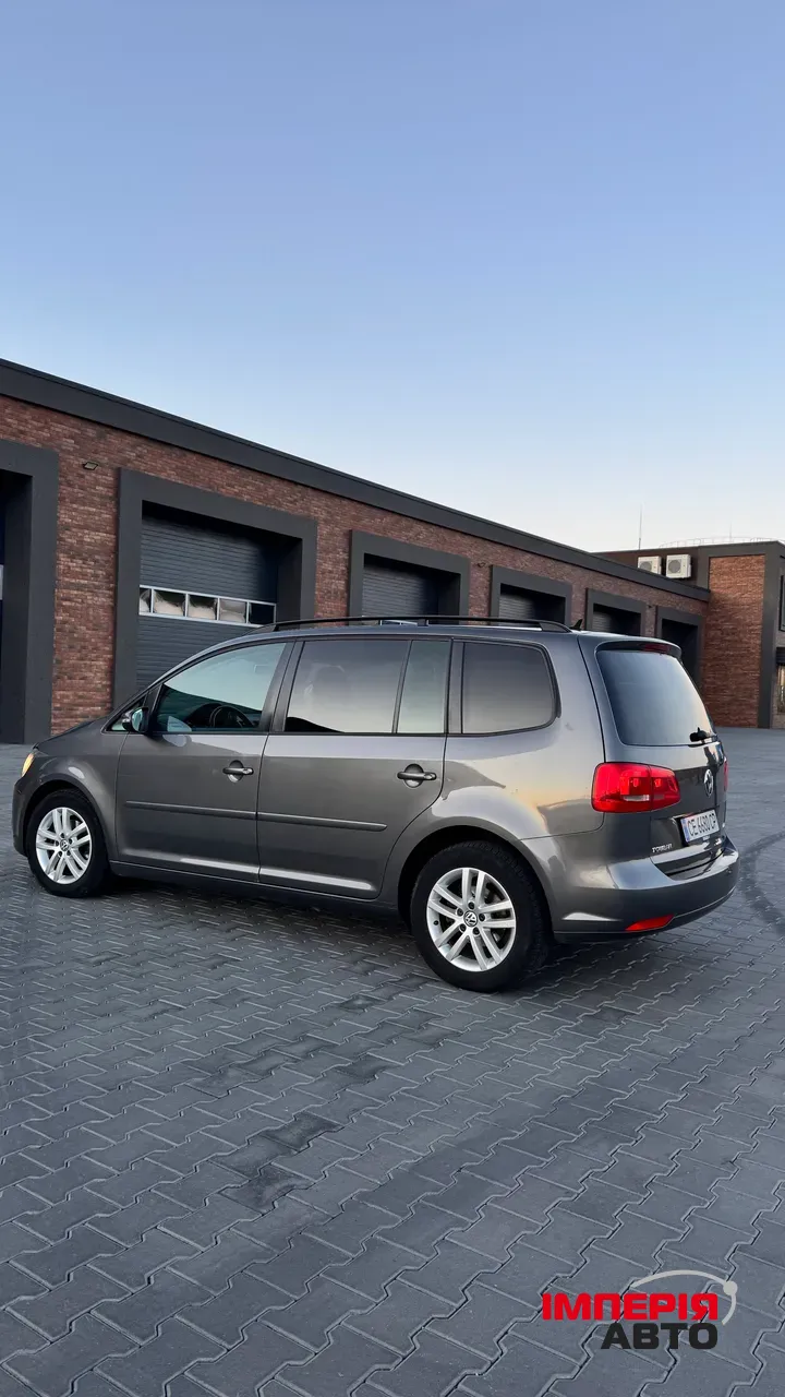 Volkswagen Touran - фото 9