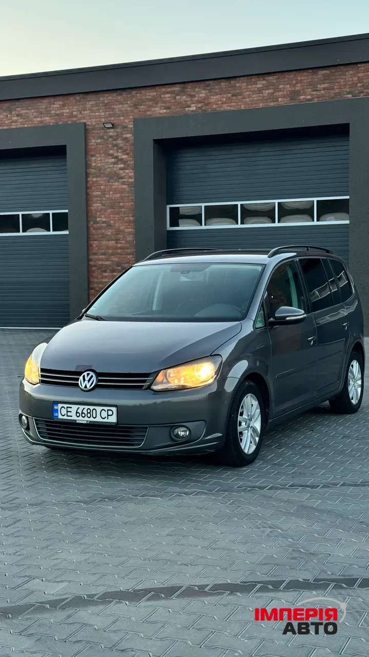 Volkswagen Touran - фото 3