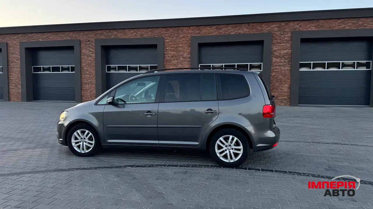 Volkswagen Touran - фото 11
