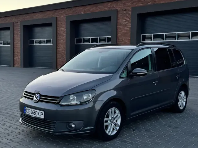 Volkswagen Touran - фото 1