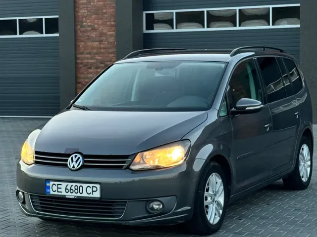 Volkswagen Touran - фото 3