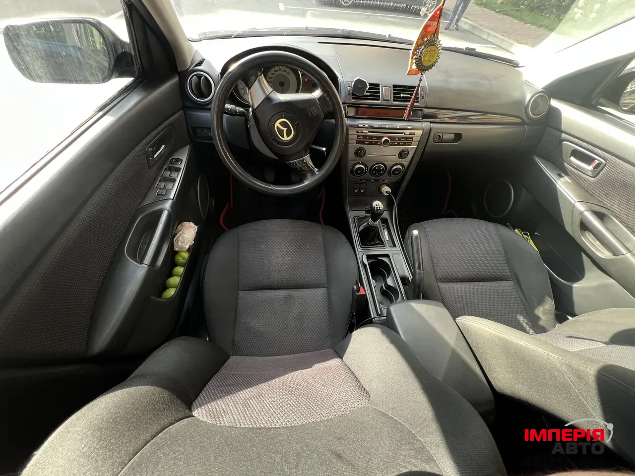 Mazda 3 - фото 11