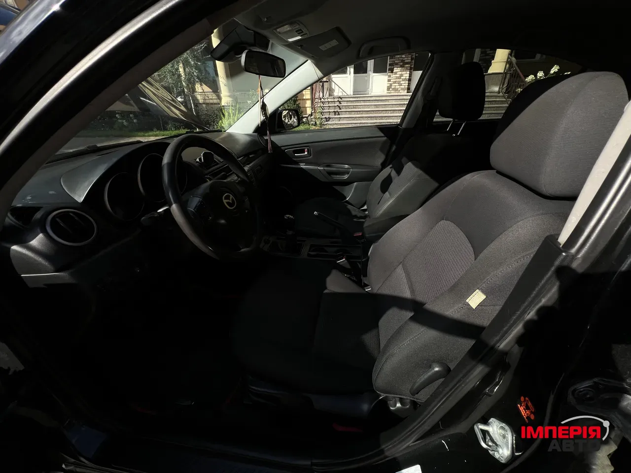 Mazda 3 - фото 12