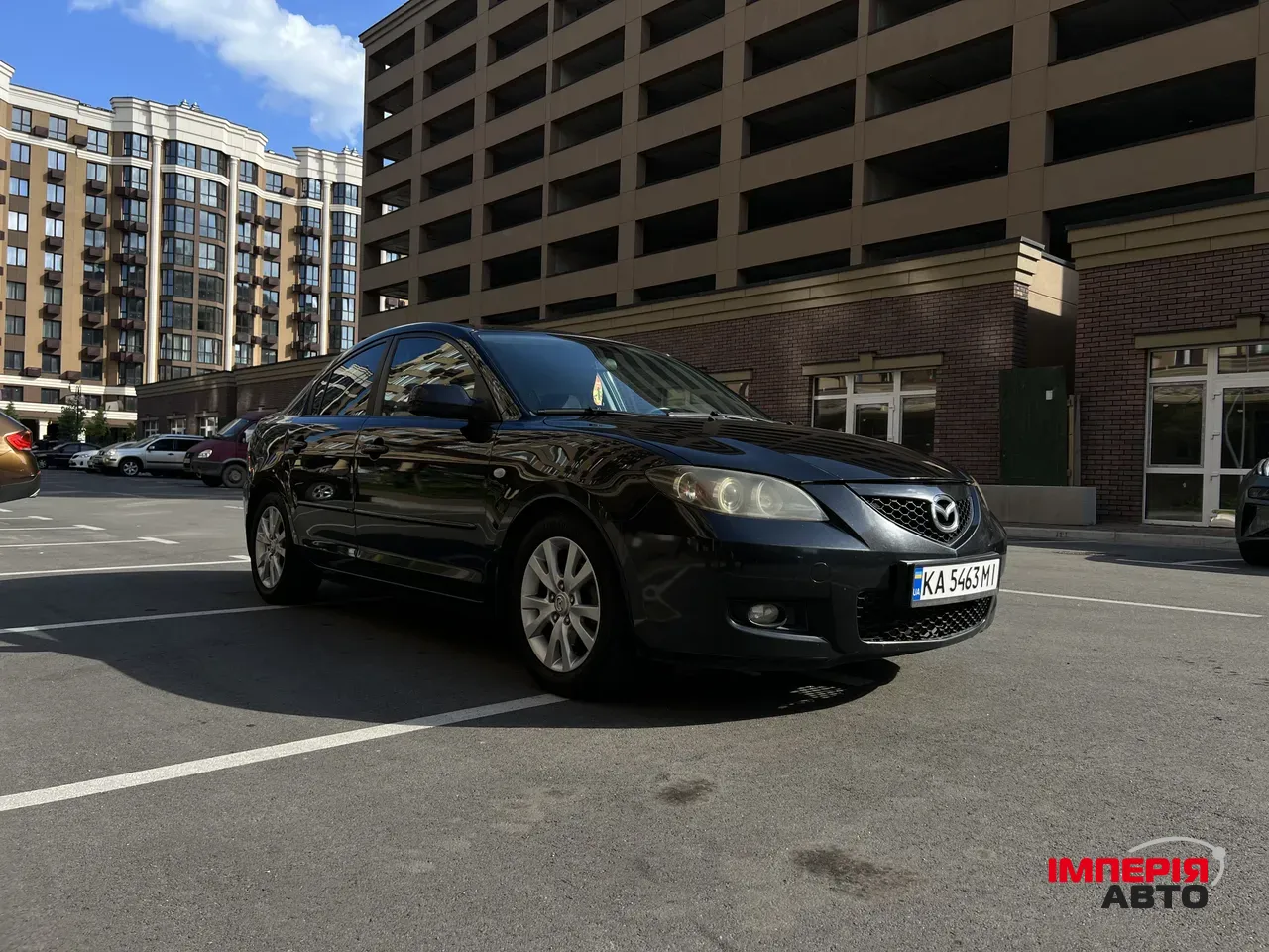 Mazda 3 - фото 10