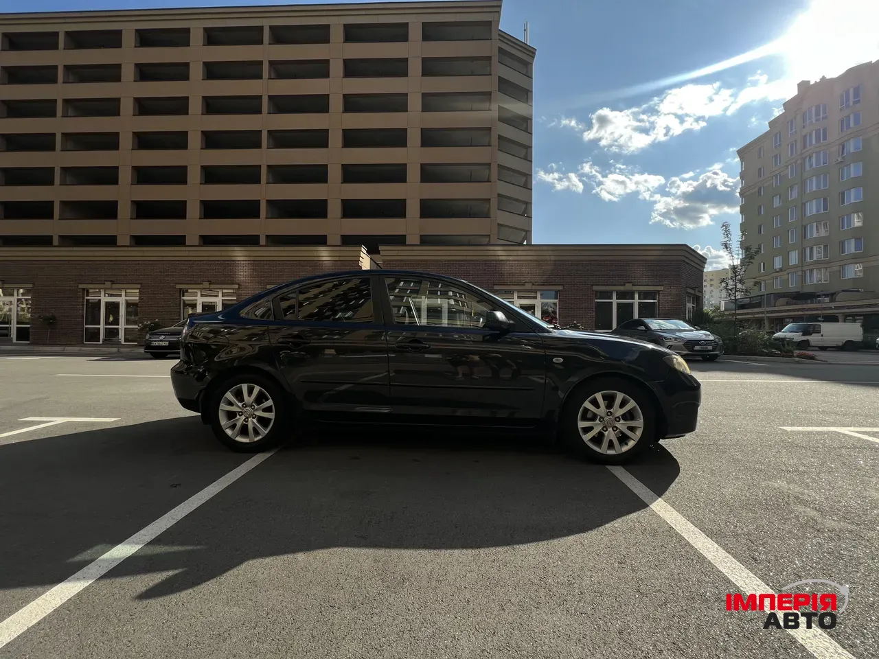 Mazda 3 - фото 7