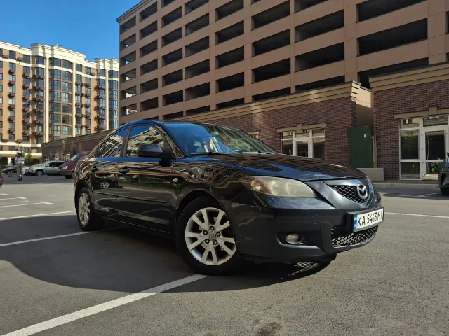 Mazda 3 - фото 1