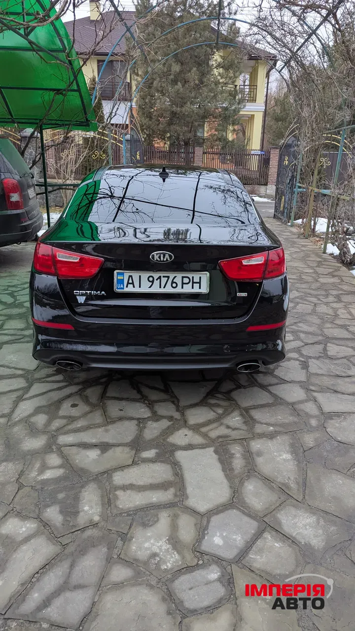 Kia Optima - фото 4