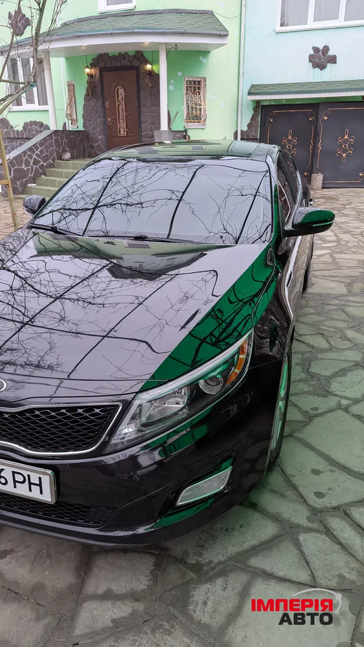 Kia Optima - фото 1