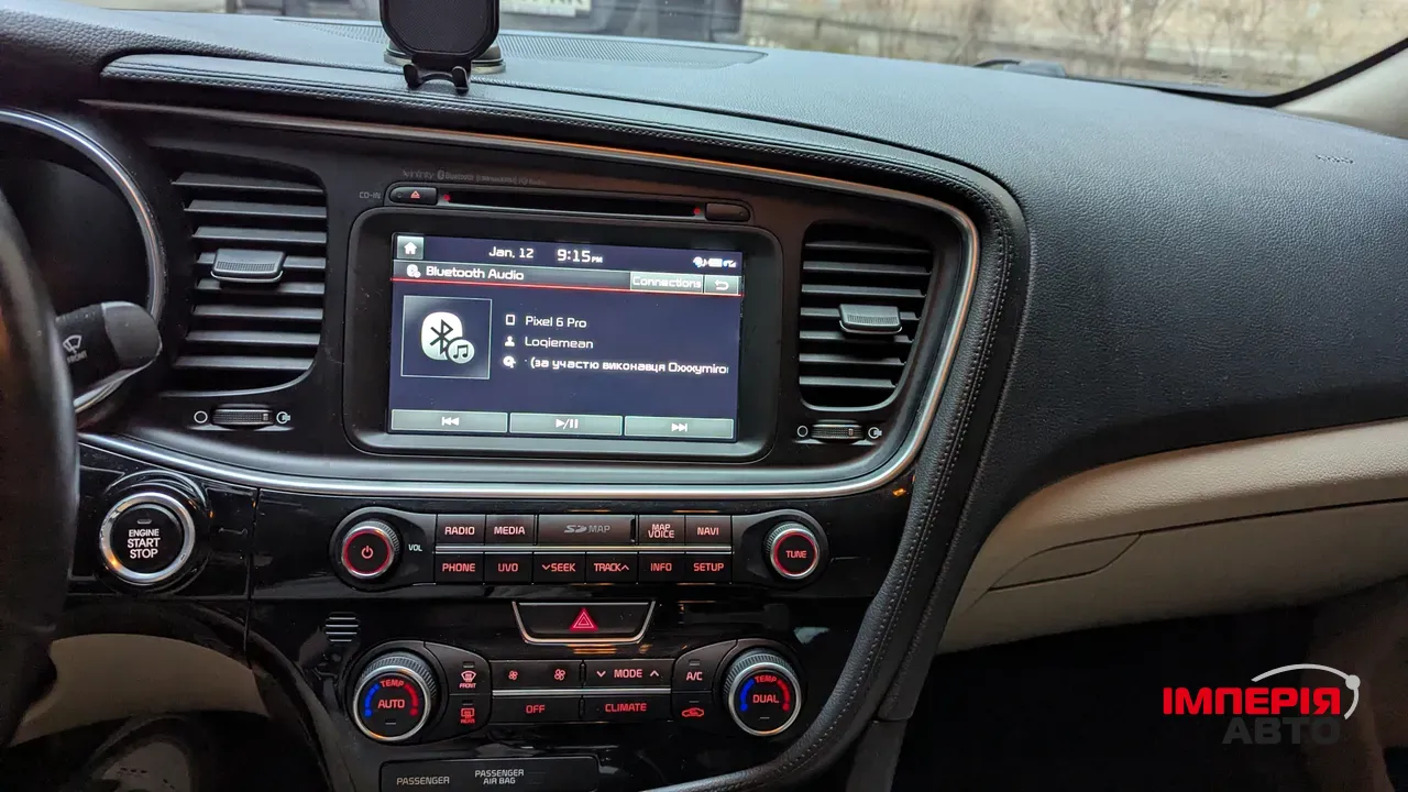 Kia Optima - фото 12