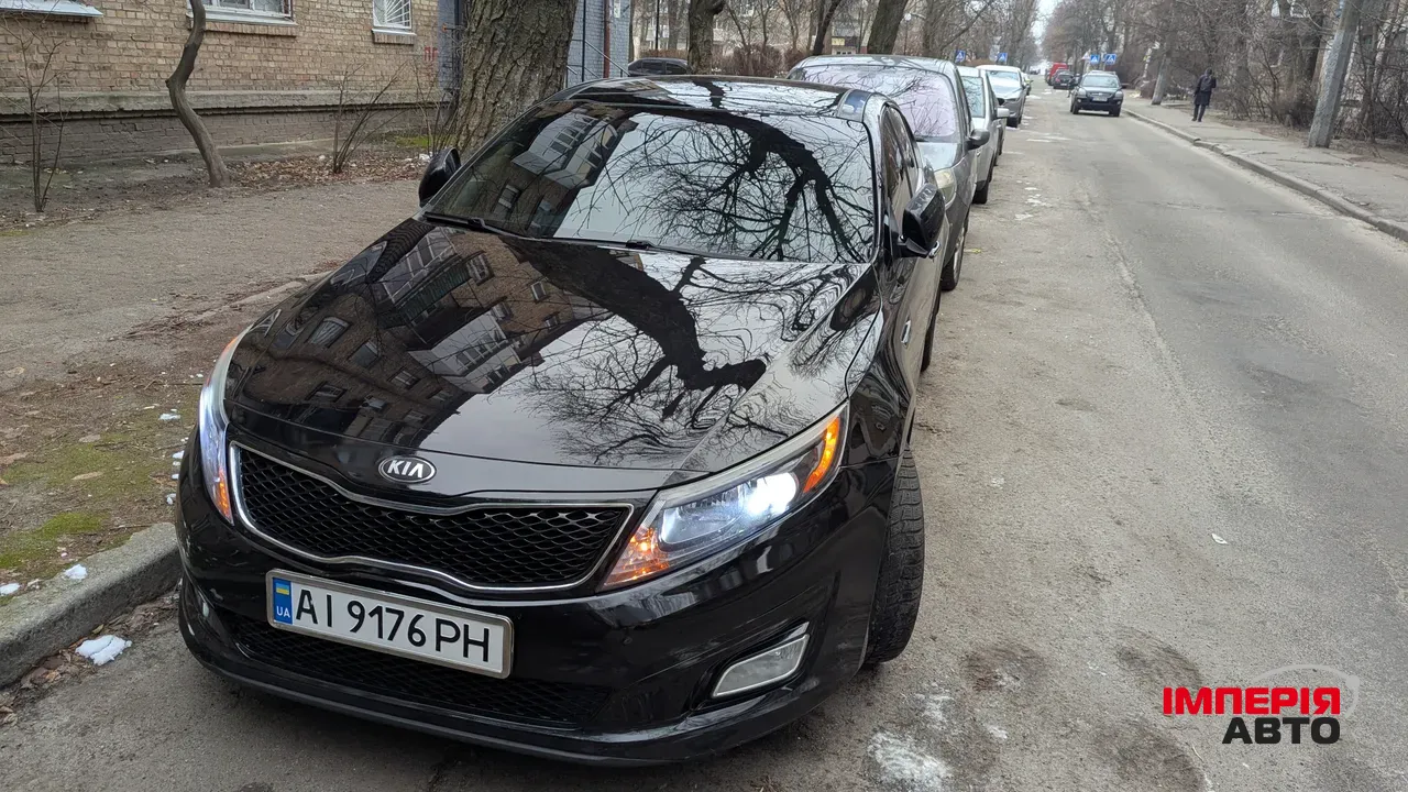 Kia Optima - фото 10