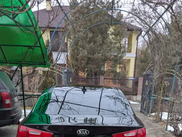 Kia Optima - фото 5