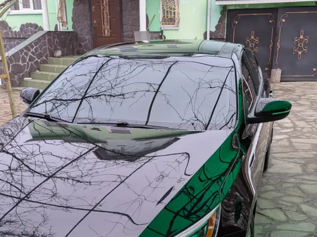 Kia Optima - фото 1