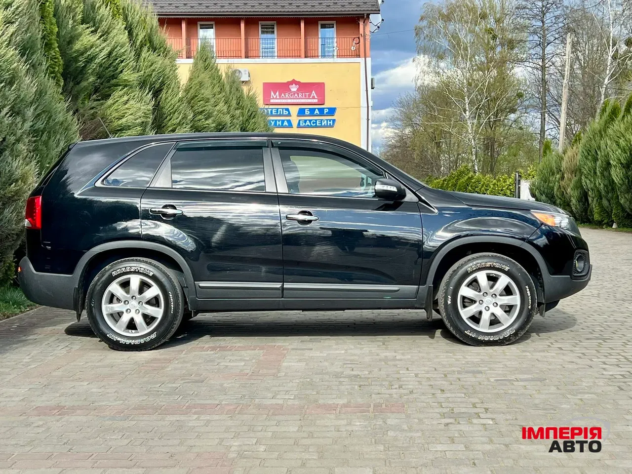 Kia Sorento - фото 6