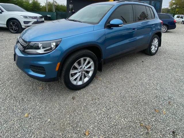 Volkswagen Tiguan - фото 1