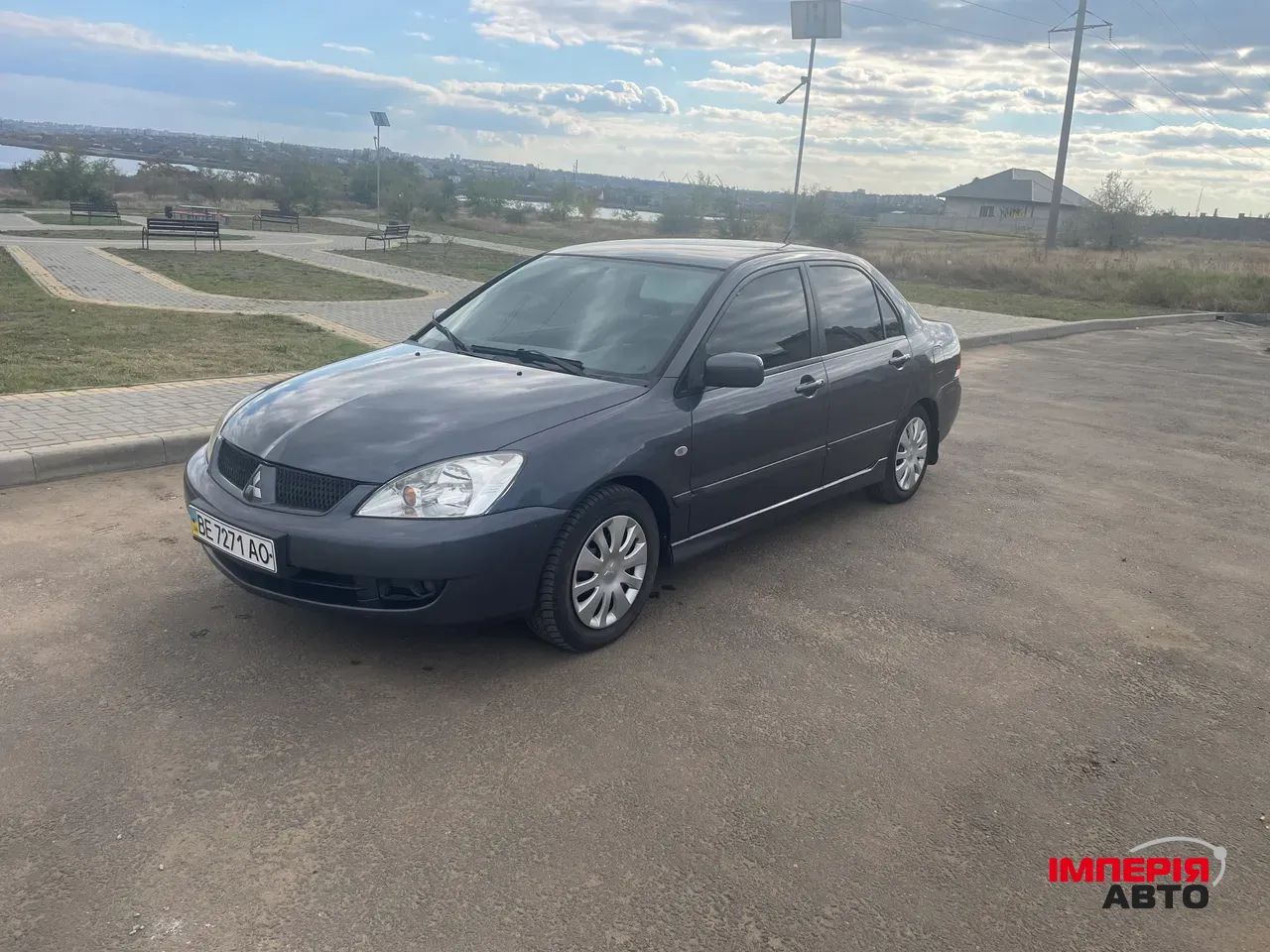 Mitsubishi Lancer - фото 1