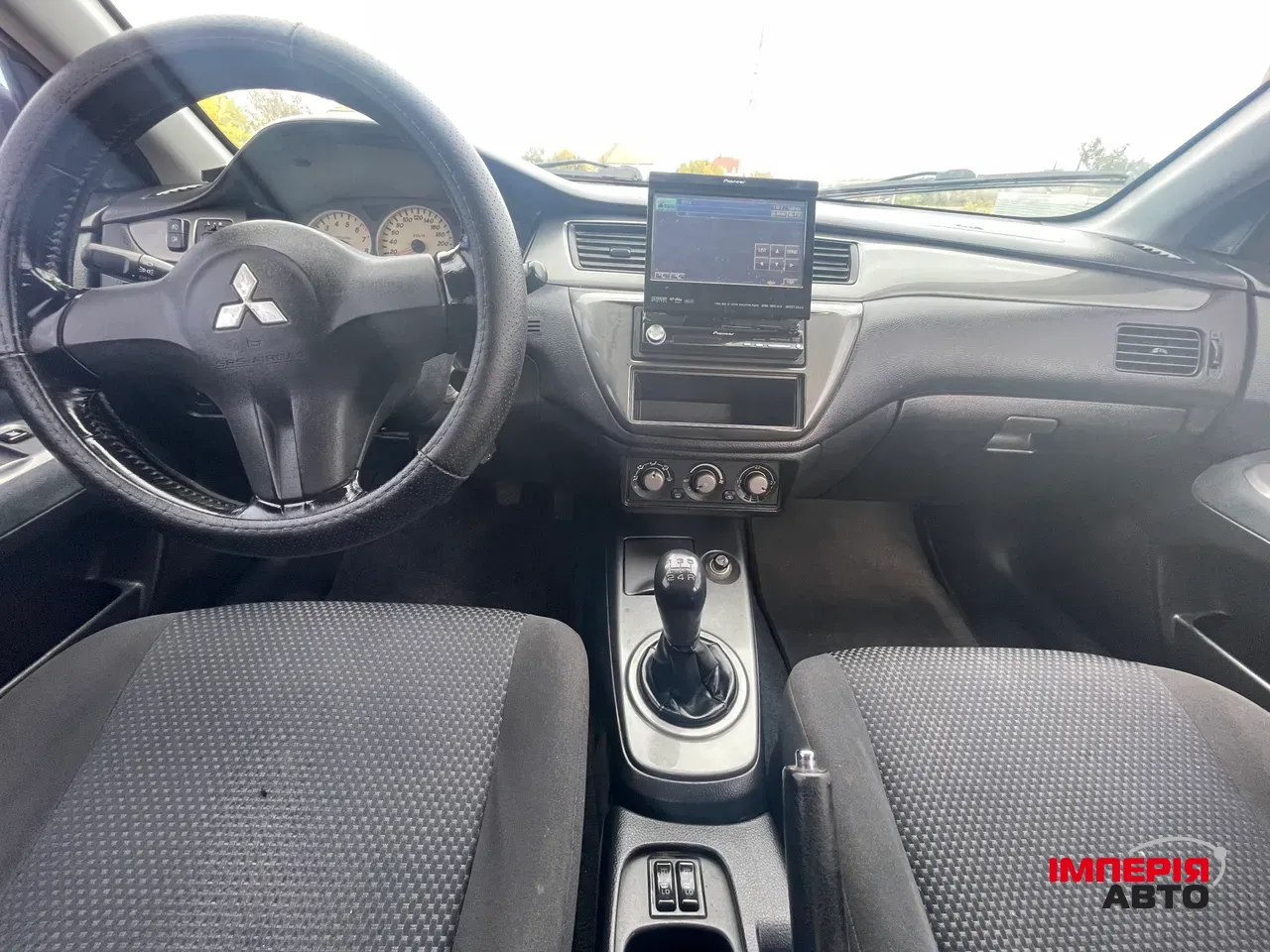 Mitsubishi Lancer - фото 18