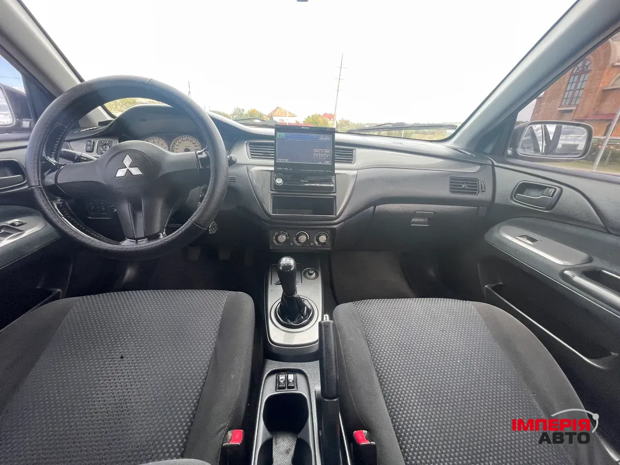 Mitsubishi Lancer - фото 13