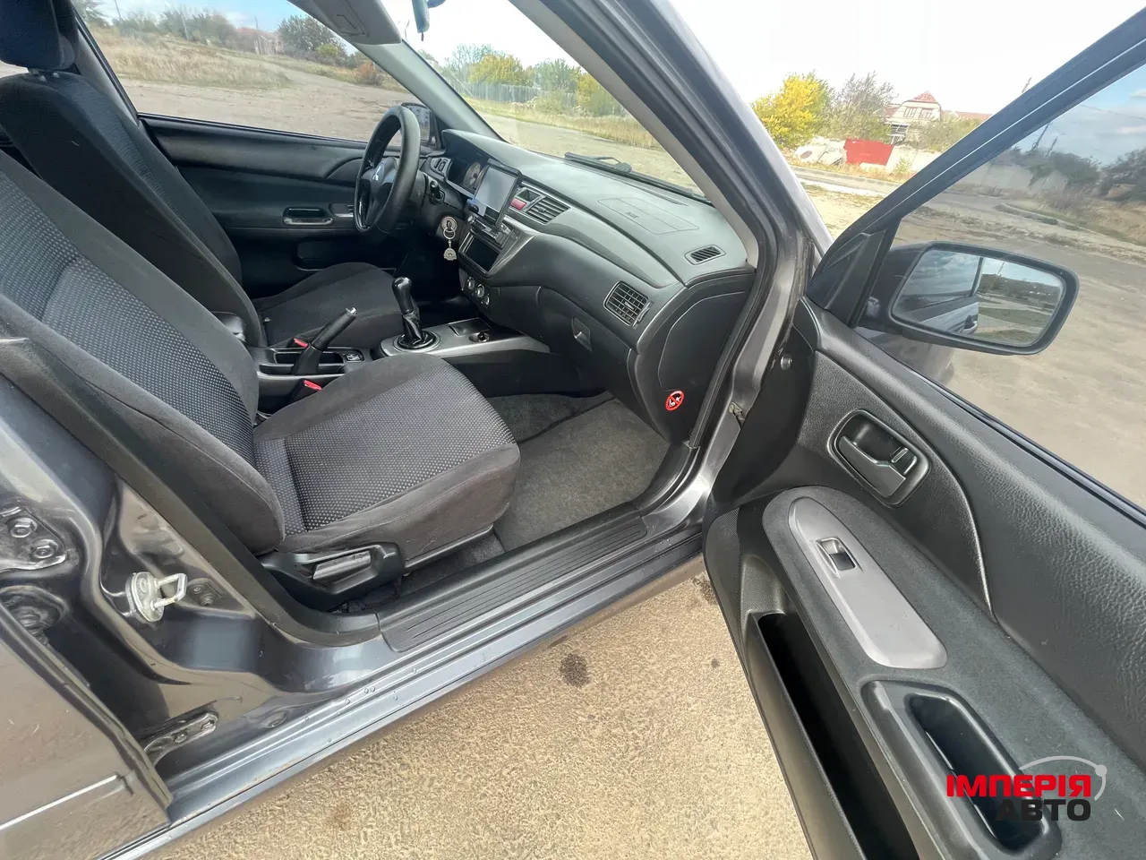 Mitsubishi Lancer - фото 16