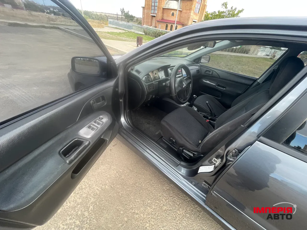 Mitsubishi Lancer - фото 6