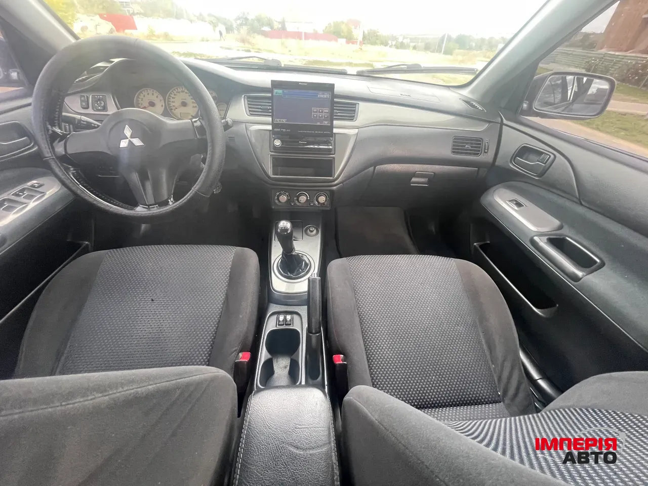 Mitsubishi Lancer - фото 11