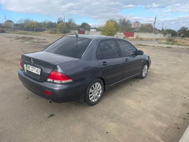 Mitsubishi Lancer - фото 3