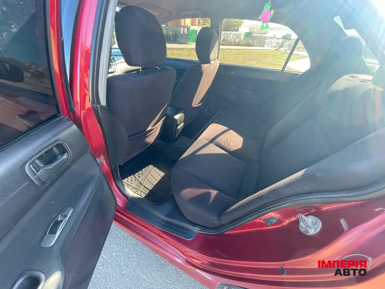 Mitsubishi Lancer - фото 11