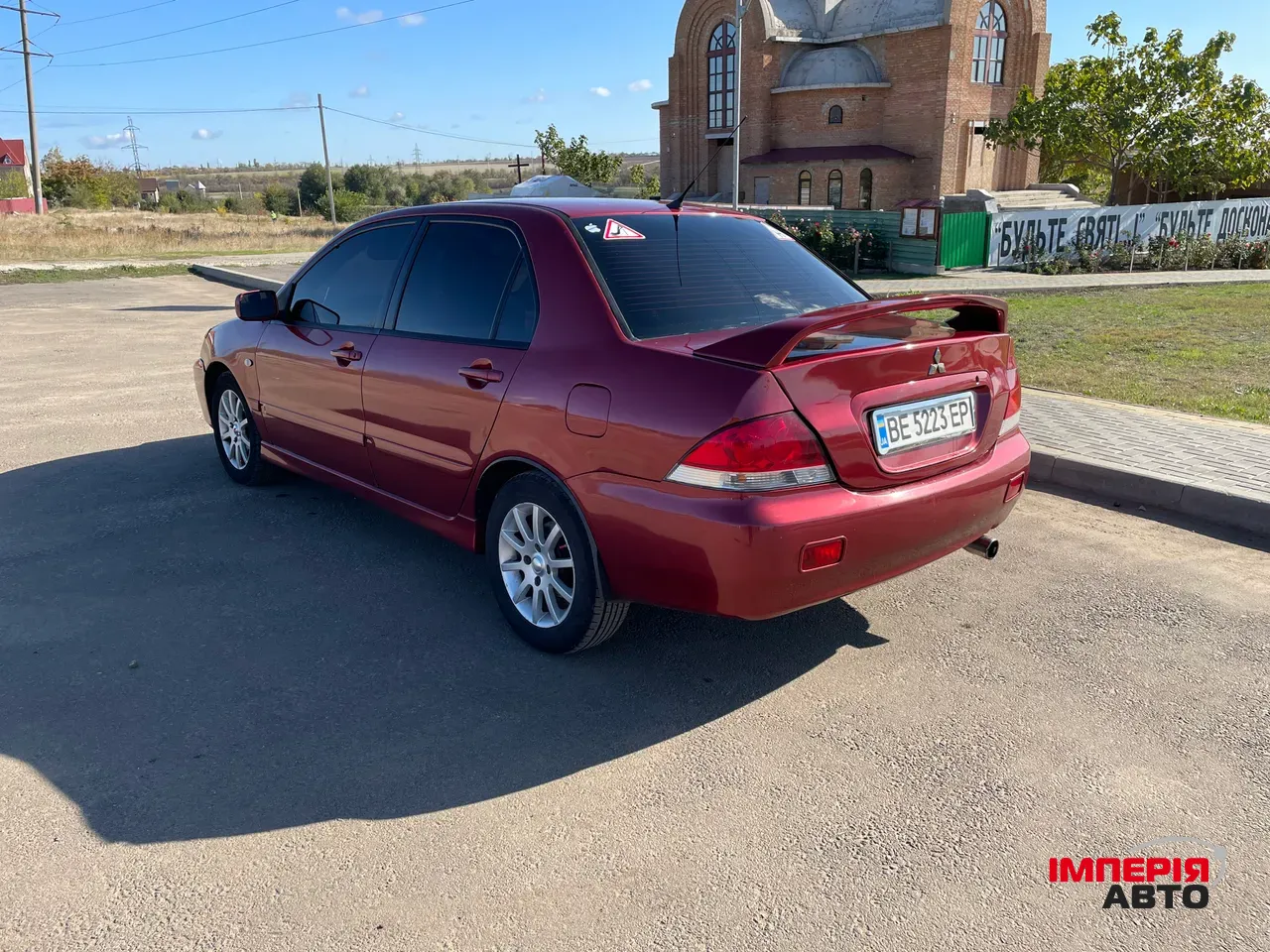 Mitsubishi Lancer - фото 13