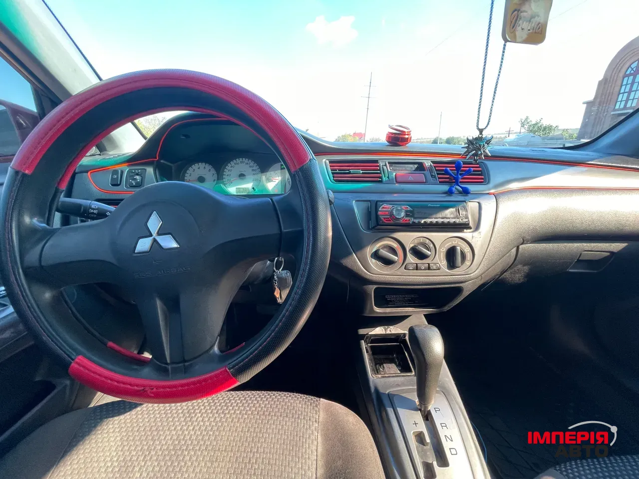 Mitsubishi Lancer - фото 12