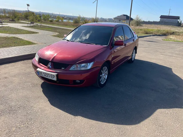 Mitsubishi Lancer - фото 1