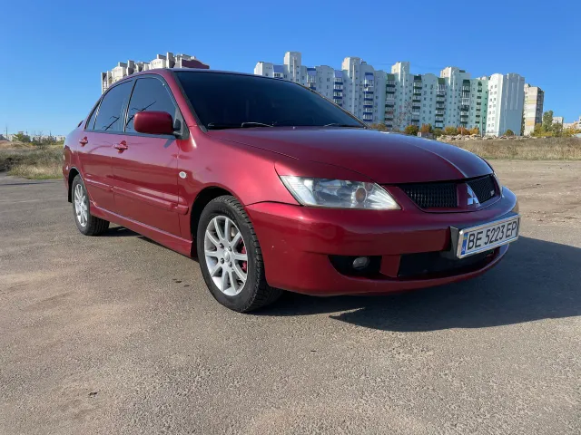 Mitsubishi Lancer - фото 3