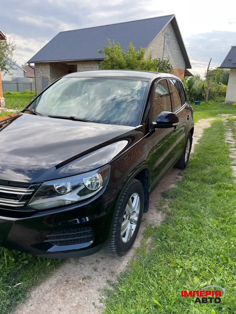 Volkswagen Tiguan - фото 2