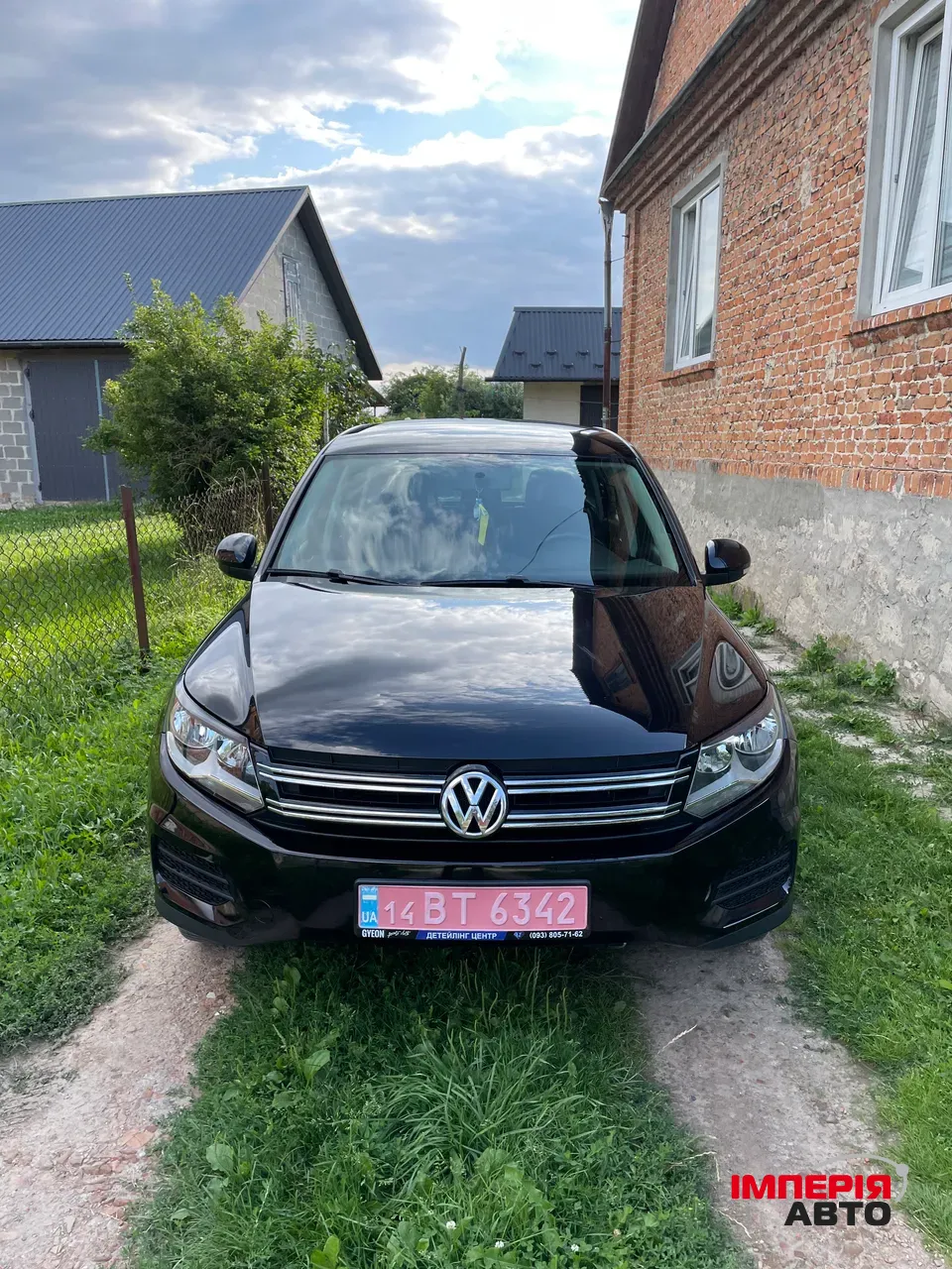 Volkswagen Tiguan - фото 1