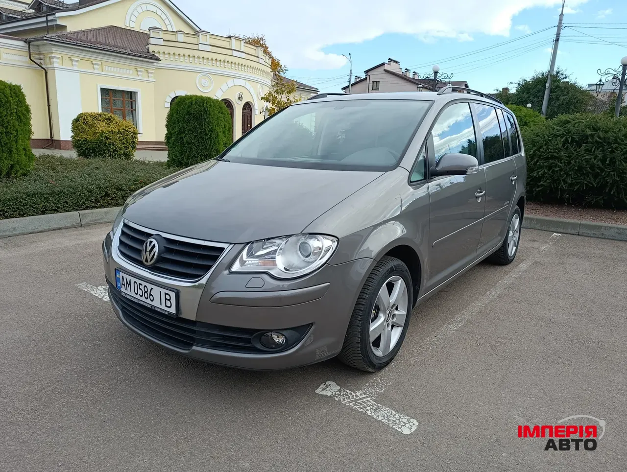 Volkswagen Touran - фото 2