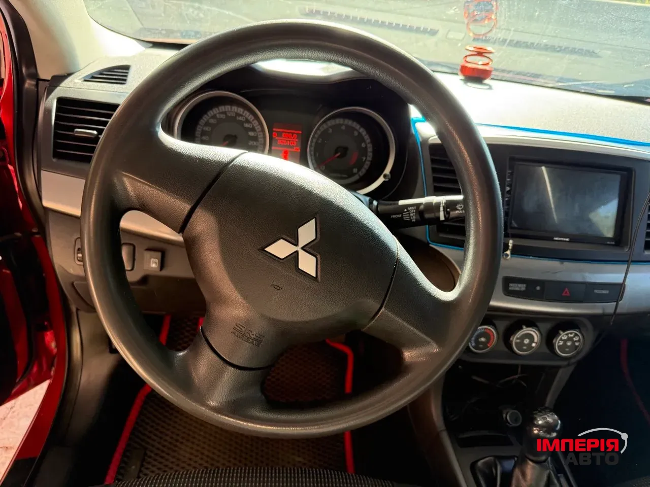 Mitsubishi Lancer - фото 2