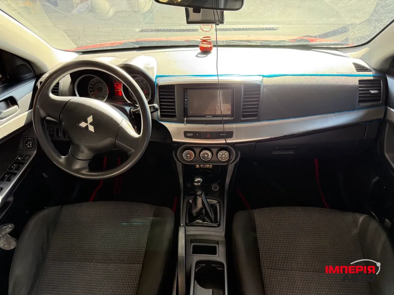 Mitsubishi Lancer - фото 3