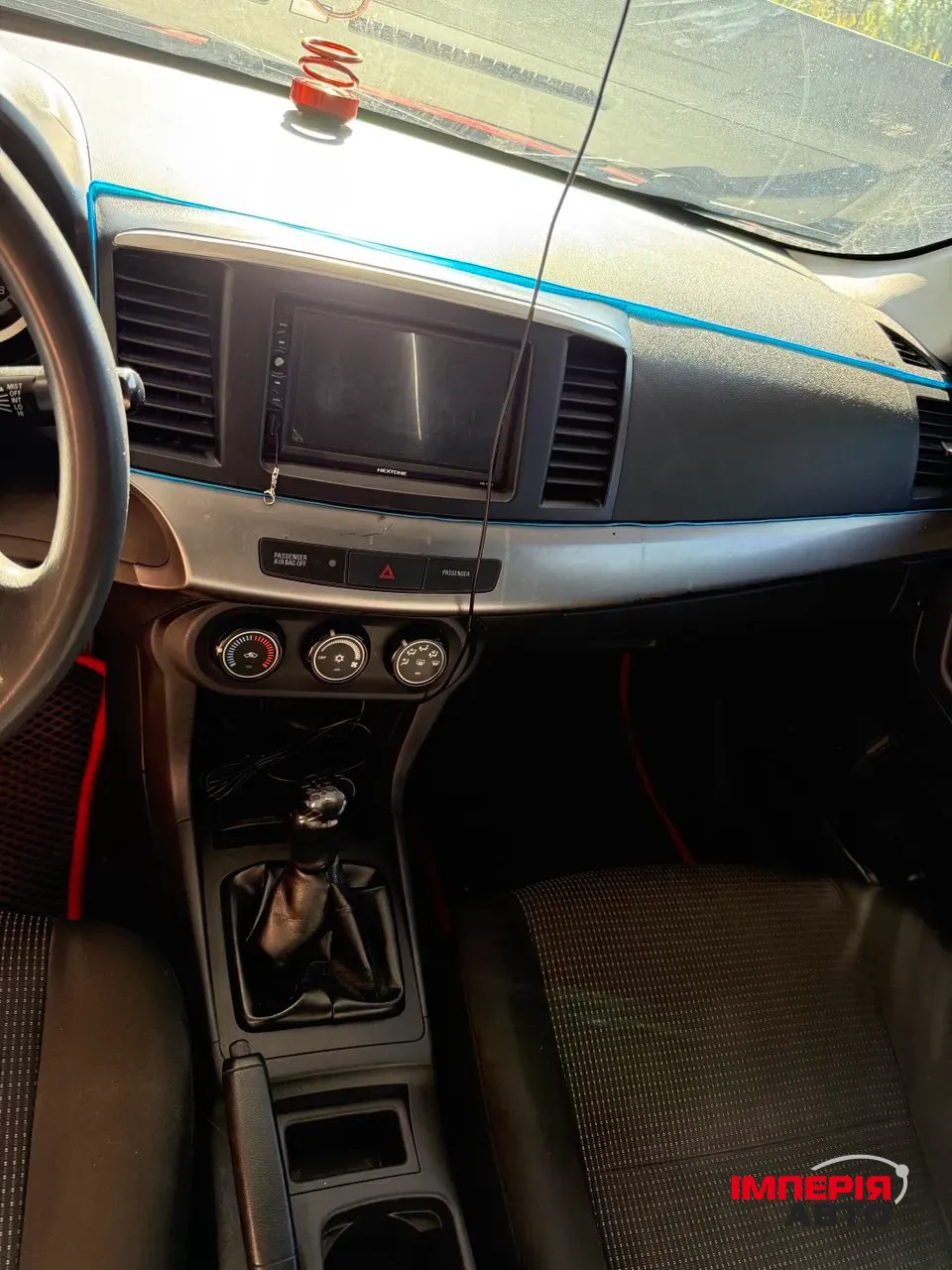 Mitsubishi Lancer - фото 4