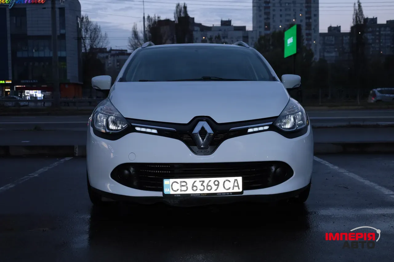 Renault Clio - фото 21