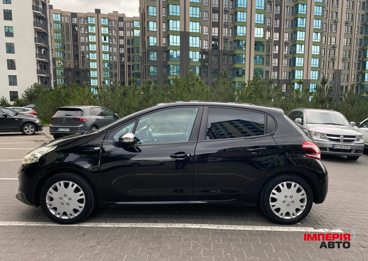 Peugeot 208 - фото 8
