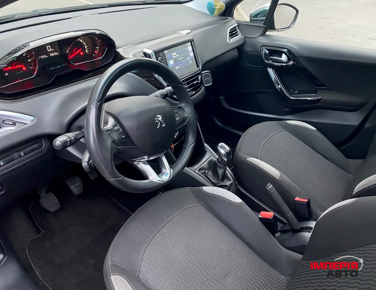 Peugeot 208 - фото 10