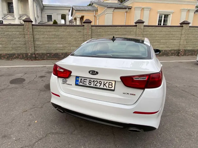 Kia Optima - фото 4