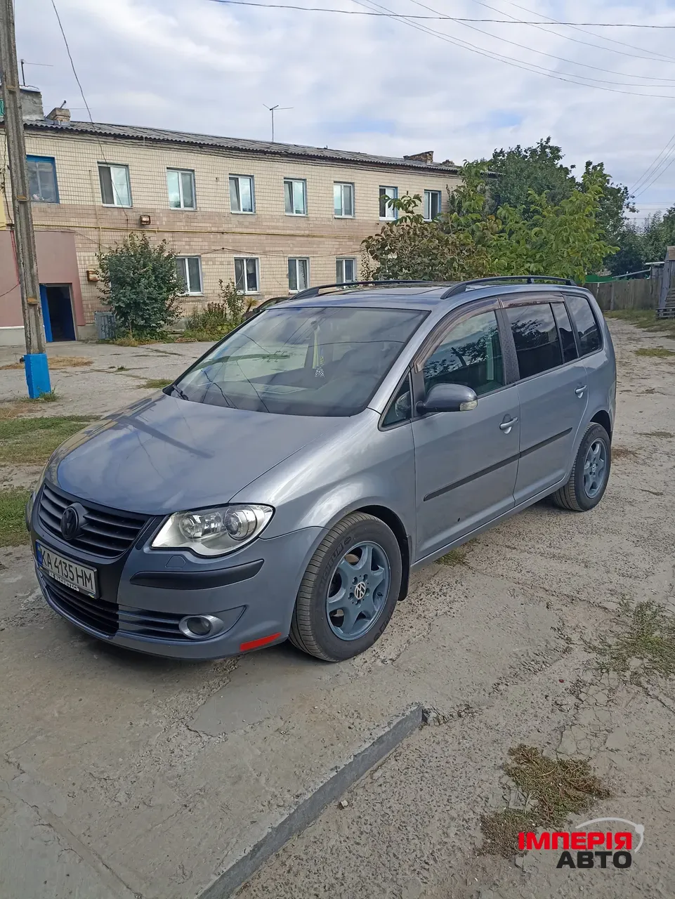 Volkswagen Touran - фото 12