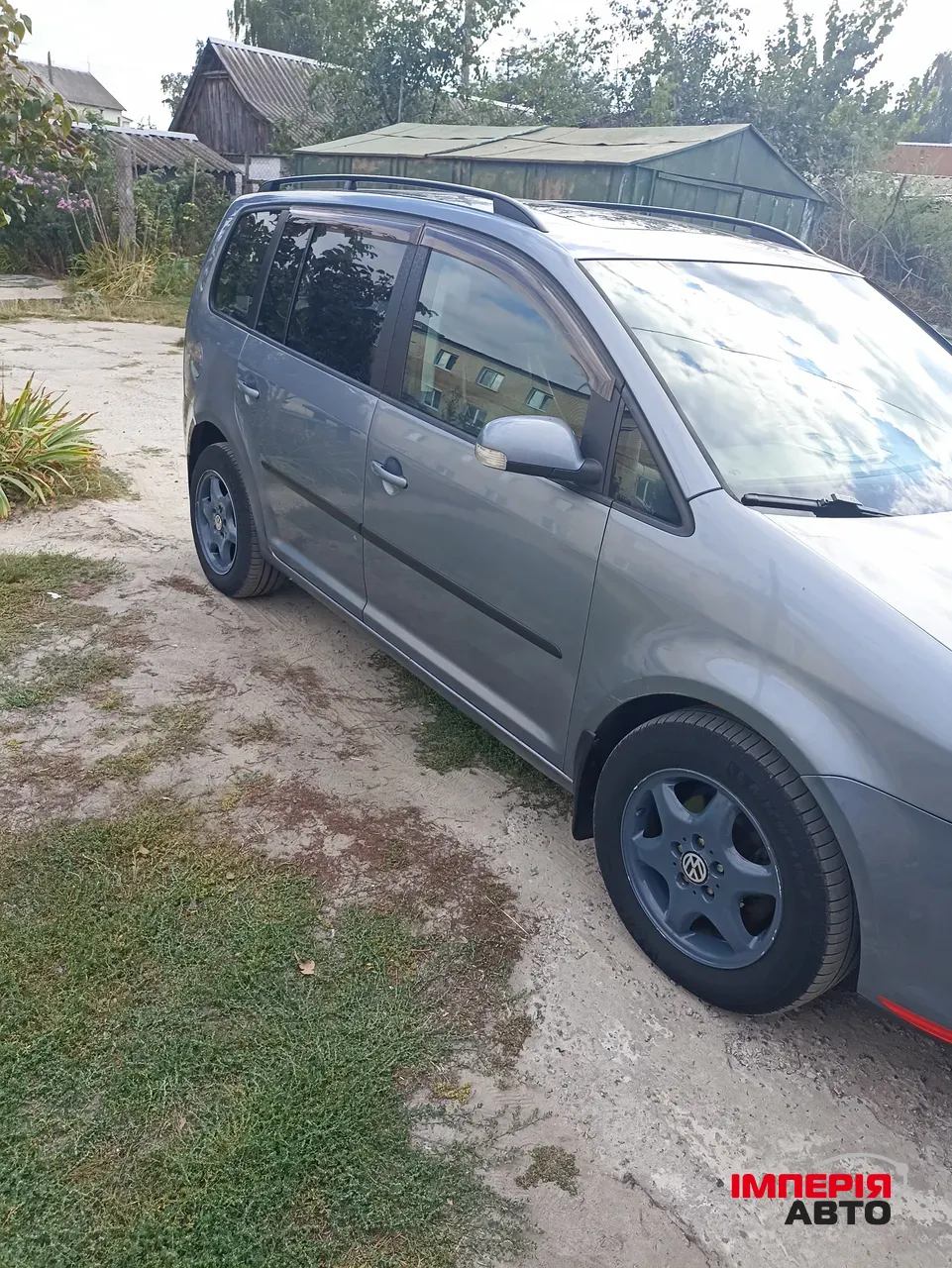Volkswagen Touran - фото 3