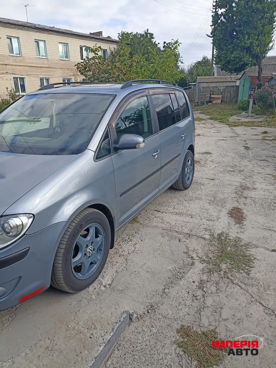 Volkswagen Touran - фото 4