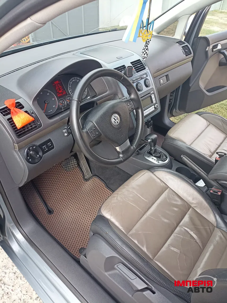 Volkswagen Touran - фото 5