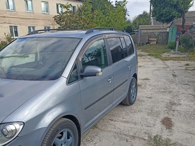 Volkswagen Touran - фото 4